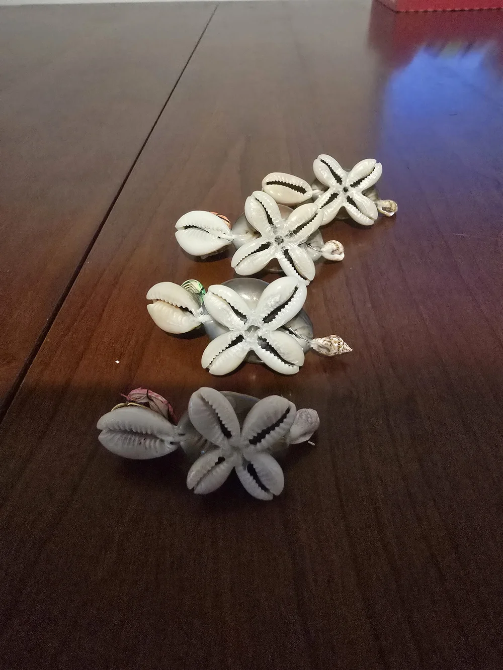 Four Cute Handmade Mini Turtles Made From Seashells with Glasses and Straw Hats